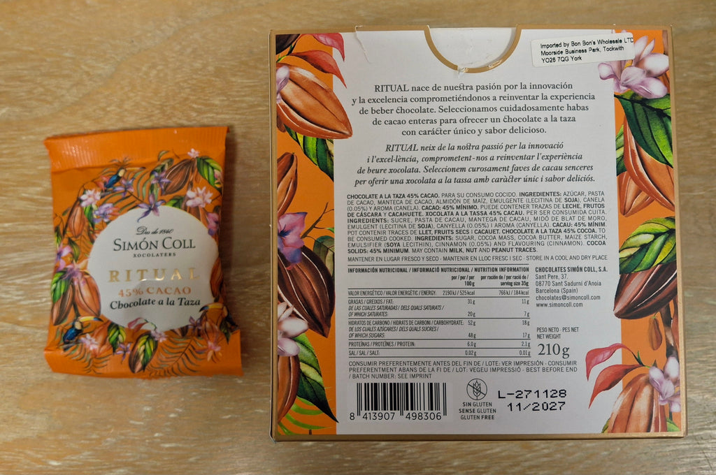 A photo of Simon Coll artisan milk drinking chocolate and its ingredients.