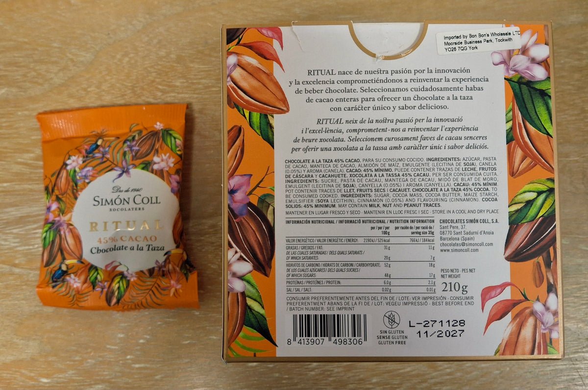 A photo of Simon Coll artisan milk drinking chocolate and its ingredients.