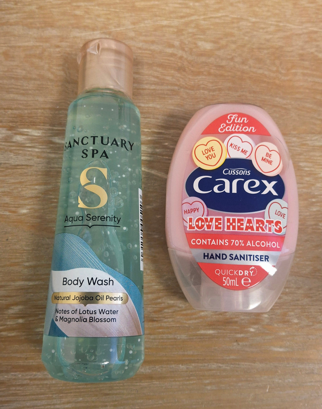 Examples of the Sanctuary Spa Aqua Serenity body wash and Carex Love Hearts hand sanitiser.