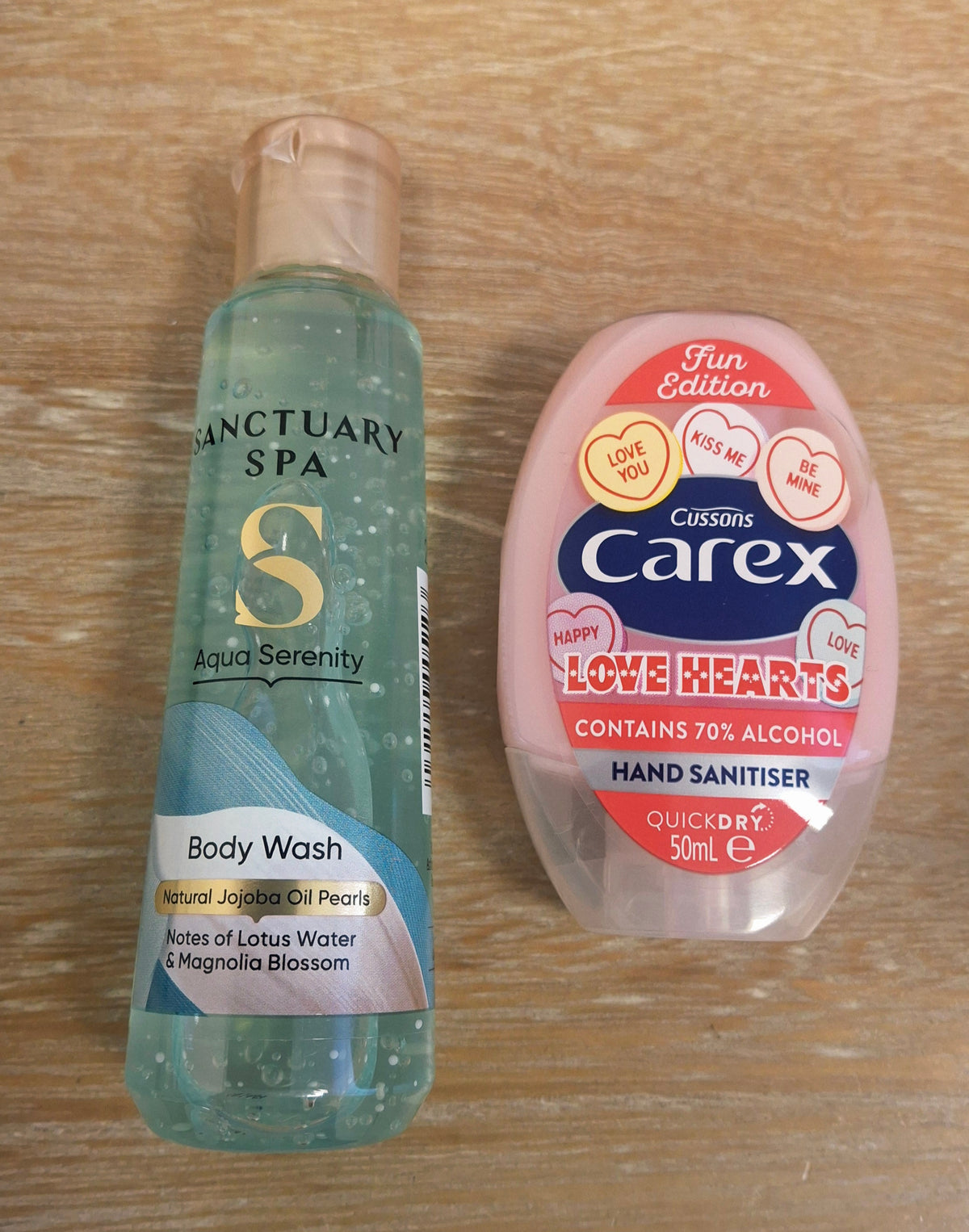 Examples of the Sanctuary Spa Aqua Serenity body wash and Carex Love Hearts hand sanitiser.