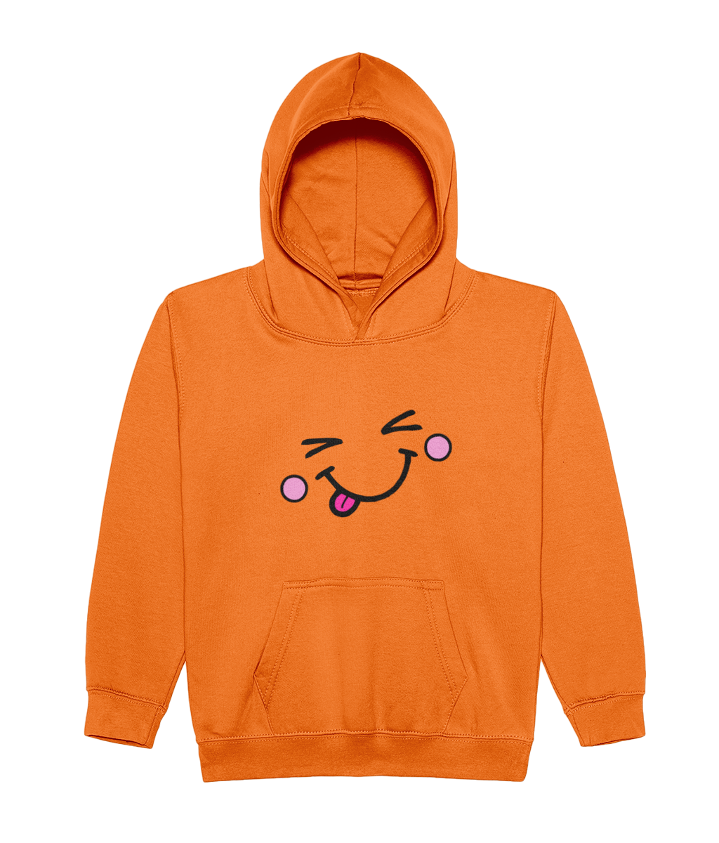 An orange pullover hoodie featuring a cute cartoon face graphic on the chest with winking eyes, pink cheeks, and a sticking-out tongue, shown against a plain white background.