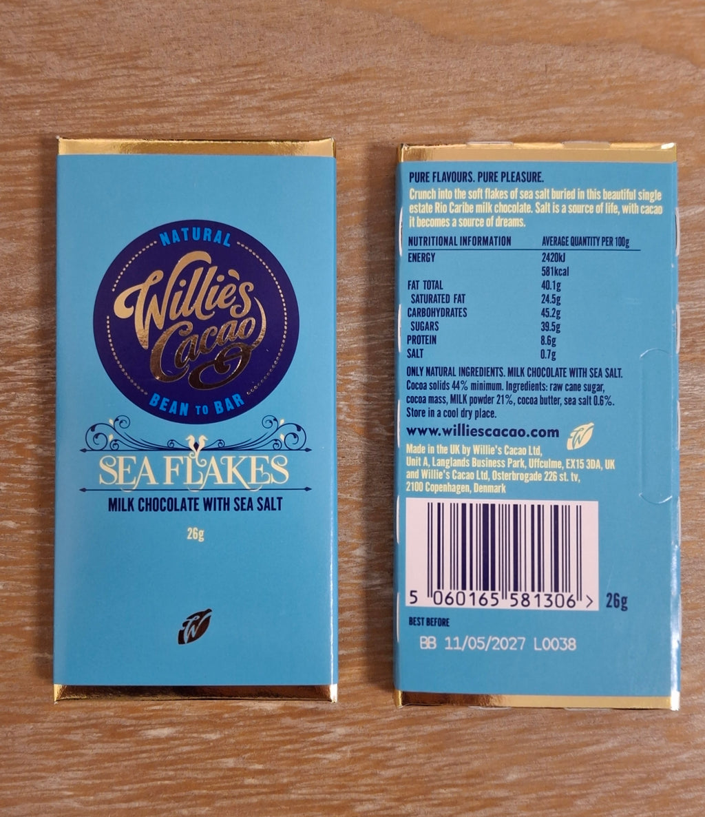 Front and back views of a Willie's Cocoa Sea Flakes milk chocolate bar with sea salt showing the ingredients.