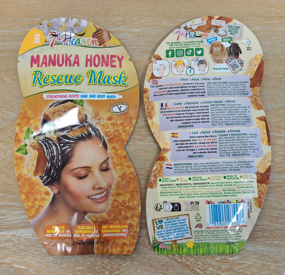 Two packets of 7th Heaven Manuka Honey Rescue Mask for hair. One side showing the front label and the other showing the ingredients.