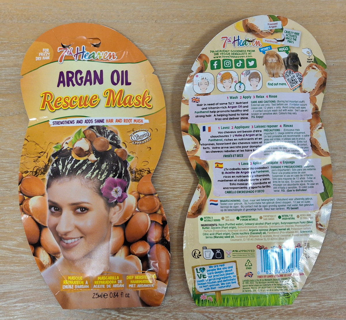 Two packets of 7th Heaven Argan Oil Rescue Mask. One side showing the illustration and the other showing the ingredients.